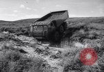 Image of British Stalwart and Gadabout all terrain vehicles United Kingdom, 1963, second 22 stock footage video 65675027996