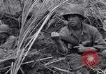 Standbild USA Soldaten Guam, 1944, aus Sekunde 54 historischem Filmmaterial Videoclip 65675028022