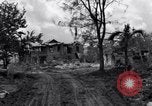 Standbild zerstörten Waffen und Flugzeugen Guam, 1944, aus Sekunde 5 historischem Filmmaterial Videoclip 65675028023