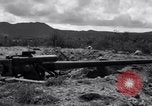 Standbild zerstörten Waffen und Flugzeugen Guam, 1944, aus Sekunde 7 historischem Filmmaterial Videoclip 65675028023
