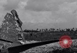 Standbild zerstörten Waffen und Flugzeugen Guam, 1944, aus Sekunde 34 historischem Filmmaterial Videoclip 65675028023