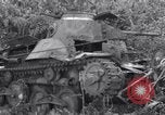 Standbild zerstörten Waffen und Flugzeugen Guam, 1944, aus Sekunde 52 historischem Filmmaterial Videoclip 65675028023