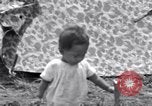 Standbild erfassten Einheimischen Guam, 1944, aus Sekunde 61 historischem Filmmaterial Videoclip 65675028026