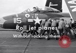 Image of Handling of jet aircraft on carrier flight deck United States USA, 1951, second 12 stock footage video 65675028028