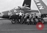 Image of Handling of jet aircraft on carrier flight deck United States USA, 1951, second 17 stock footage video 65675028028