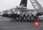 Image of Handling of jet aircraft on carrier flight deck United States USA, 1951, second 18 stock footage video 65675028028