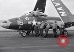 Image of Handling of jet aircraft on carrier flight deck United States USA, 1951, second 20 stock footage video 65675028028
