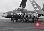 Image of Handling of jet aircraft on carrier flight deck United States USA, 1951, second 21 stock footage video 65675028028
