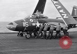 Image of Handling of jet aircraft on carrier flight deck United States USA, 1951, second 22 stock footage video 65675028028