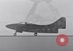 Image of Handling of jet aircraft on carrier flight deck United States USA, 1951, second 26 stock footage video 65675028028