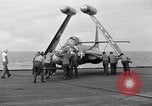 Image of Handling of jet aircraft on carrier flight deck United States USA, 1951, second 45 stock footage video 65675028028