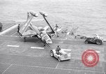 Image of Handling of jet aircraft on carrier flight deck United States USA, 1951, second 52 stock footage video 65675028028