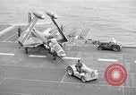Image of Handling of jet aircraft on carrier flight deck United States USA, 1951, second 54 stock footage video 65675028028