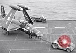 Image of Handling of jet aircraft on carrier flight deck United States USA, 1951, second 58 stock footage video 65675028028