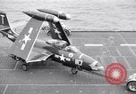 Image of Handling of jet aircraft on carrier flight deck United States USA, 1951, second 60 stock footage video 65675028028