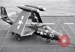 Image of Handling of jet aircraft on carrier flight deck United States USA, 1951, second 61 stock footage video 65675028028