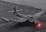 Image of Recovering jet aircraft returning to aircraft carrier United States USA, 1951, second 3 stock footage video 65675028032