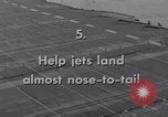 Image of Recovering jet aircraft returning to aircraft carrier United States USA, 1951, second 7 stock footage video 65675028032