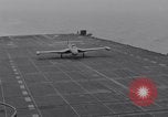 Image of Recovering jet aircraft returning to aircraft carrier United States USA, 1951, second 12 stock footage video 65675028032