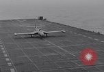 Image of Recovering jet aircraft returning to aircraft carrier United States USA, 1951, second 13 stock footage video 65675028032