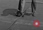 Image of Recovering jet aircraft returning to aircraft carrier United States USA, 1951, second 19 stock footage video 65675028032