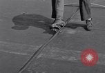 Image of Recovering jet aircraft returning to aircraft carrier United States USA, 1951, second 21 stock footage video 65675028032