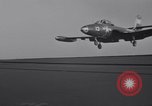 Image of Recovering jet aircraft returning to aircraft carrier United States USA, 1951, second 28 stock footage video 65675028032