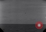 Standbild OS2U Kingfisher scout Wasserflugzeug landet in Wasser Majuro Marshall Inseln, 1944, aus Sekunde 24 historischem Filmmaterial Videoclip 65675028036