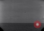 Standbild OS2U Kingfisher scout Wasserflugzeug landet in Wasser Majuro Marshall Inseln, 1944, aus Sekunde 26 historischem Filmmaterial Videoclip 65675028036