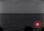 Standbild OS2U Kingfisher scout Wasserflugzeug landet in Wasser Majuro Marshall Inseln, 1944, aus Sekunde 28 historischem Filmmaterial Videoclip 65675028036