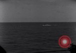 Standbild OS2U Kingfisher scout Wasserflugzeug landet in Wasser Majuro Marshall Inseln, 1944, aus Sekunde 30 historischem Filmmaterial Videoclip 65675028036