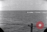 Standbild OS2U Kingfisher scout Wasserflugzeug landet in Wasser Majuro Marshall Inseln, 1944, aus Sekunde 47 historischem Filmmaterial Videoclip 65675028036