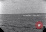 Standbild OS2U Kingfisher scout Wasserflugzeug landet in Wasser Majuro Marshall Inseln, 1944, aus Sekunde 50 historischem Filmmaterial Videoclip 65675028036