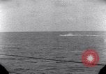 Standbild OS2U Kingfisher scout Wasserflugzeug landet in Wasser Majuro Marshall Inseln, 1944, aus Sekunde 53 historischem Filmmaterial Videoclip 65675028036