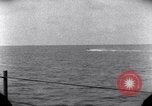 Standbild OS2U Kingfisher scout Wasserflugzeug landet in Wasser Majuro Marshall Inseln, 1944, aus Sekunde 54 historischem Filmmaterial Videoclip 65675028036