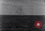 Standbild US-Kriegsschiffe der Pazifikflotte verankert während Zweiten Weltkrieg Majuro Marshall Inseln, 1944, aus Sekunde 5 historischem Filmmaterial Videoclip 65675028037