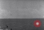Standbild US-Kriegsschiffe der Pazifikflotte verankert während Zweiten Weltkrieg Majuro Marshall Inseln, 1944, aus Sekunde 48 historischem Filmmaterial Videoclip 65675028037