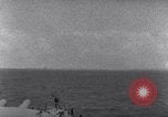 Standbild US-Kriegsschiffe der Pazifikflotte verankert während Zweiten Weltkrieg Majuro Marshall Inseln, 1944, aus Sekunde 54 historischem Filmmaterial Videoclip 65675028037