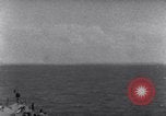 Standbild US-Kriegsschiffe der Pazifikflotte verankert während Zweiten Weltkrieg Majuro Marshall Inseln, 1944, aus Sekunde 60 historischem Filmmaterial Videoclip 65675028037