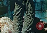 Standbild Marines behandeln Verletzte Saipan Nördliche Marianen, 1944, aus Sekunde 26 historischem Filmmaterial Videoclip 65675028042