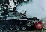 Standbild brennende japanische Typ 95 light Tanks Saipan Nördliche Marianen, 1944, aus Sekunde 3 historischem Filmmaterial Videoclip 65675028046