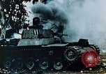 Standbild brennende japanische Typ 95 light Tanks Saipan Nördliche Marianen, 1944, aus Sekunde 6 historischem Filmmaterial Videoclip 65675028046