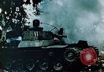 Standbild brennende japanische Typ 95 light Tanks Saipan Nördliche Marianen, 1944, aus Sekunde 8 historischem Filmmaterial Videoclip 65675028046