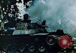 Standbild brennende japanische Typ 95 light Tanks Saipan Nördliche Marianen, 1944, aus Sekunde 9 historischem Filmmaterial Videoclip 65675028046