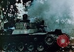 Standbild brennende japanische Typ 95 light Tanks Saipan Nördliche Marianen, 1944, aus Sekunde 10 historischem Filmmaterial Videoclip 65675028046