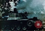 Standbild brennende japanische Typ 95 light Tanks Saipan Nördliche Marianen, 1944, aus Sekunde 11 historischem Filmmaterial Videoclip 65675028046
