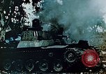Standbild brennende japanische Typ 95 light Tanks Saipan Nördliche Marianen, 1944, aus Sekunde 12 historischem Filmmaterial Videoclip 65675028046