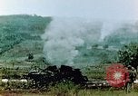 Standbild brennende japanische Typ 95 light Tanks Saipan Nördliche Marianen, 1944, aus Sekunde 18 historischem Filmmaterial Videoclip 65675028046