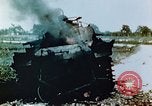 Standbild brennende japanische Typ 95 light Tanks Saipan Nördliche Marianen, 1944, aus Sekunde 29 historischem Filmmaterial Videoclip 65675028046