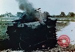 Standbild brennende japanische Typ 95 light Tanks Saipan Nördliche Marianen, 1944, aus Sekunde 31 historischem Filmmaterial Videoclip 65675028046